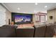 Media room featuring a large screen, theater seating, and wood flooring at 1090 Compton Way, Suwanee, GA 30024