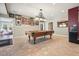 Recreation room featuring pool table, tile floors, neutral walls and bar area at 1090 Compton Way, Suwanee, GA 30024