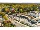 Aerial view of Vinings Jubilee's commercial area with restaurants and local businesses surrounded by lush greenery at 3582 Grove Gate Ln, Atlanta, GA 30339