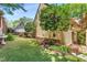 Expansive backyard featuring lush lawn, mature trees, and tidy landscaping around the house's perimeter at 3582 Grove Gate Ln, Atlanta, GA 30339