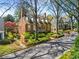 Charming two-story brick home featuring manicured landscaping and a classic colonial design at 3582 Grove Gate Ln, Atlanta, GA 30339