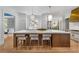 Bright kitchen features a large island with bar stool seating at 3582 Grove Gate Ln, Atlanta, GA 30339