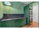 A laundry room with sink, modern washer and dryer and lots of storage at 3582 Grove Gate Ln, Atlanta, GA 30339