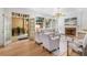 Elegant living room featuring a fireplace and access to an outdoor porch at 3582 Grove Gate Ln, Atlanta, GA 30339