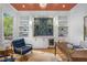 Stylish office with custom built-ins, desk, and designer accents at 3582 Grove Gate Ln, Atlanta, GA 30339