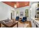 Inviting home office with stylish decor, custom shelving, and abundant natural light at 3582 Grove Gate Ln, Atlanta, GA 30339
