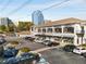 Retail building at Vinings Jubilee with ample parking, featuring various shops like China Moon and Wolfson at 3582 Grove Gate Ln, Atlanta, GA 30339