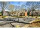 Charming neighborhood street view featuring well-maintained homes and mature trees at 3582 Grove Gate Ln, Atlanta, GA 30339