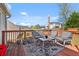 Spacious back deck with outdoor seating, umbrella, and views of the neighborhood at 85 Ann Se Cir, Cartersville, GA 30121