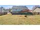 Spacious backyard featuring a deck and fire pit, perfect for outdoor entertaining and relaxation at 85 Ann Se Cir, Cartersville, GA 30121