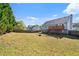 Expansive backyard with a wooden deck, offering ample space for recreation and outdoor activities at 85 Ann Se Cir, Cartersville, GA 30121