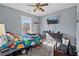 Comfortable bedroom with ceiling fan, tv, and dresser, creating an ideal space for rest and entertainment at 85 Ann Se Cir, Cartersville, GA 30121