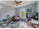 Inviting bedroom featuring a cozy beanbag chair, a study space, and natural light for work and relaxation at 85 Ann Se Cir, Cartersville, GA 30121