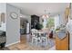 Bright dining area with white table, stainless steel appliances, and easy access to kitchen for seamless entertaining at 85 Ann Se Cir, Cartersville, GA 30121