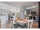 Cozy dining area with seating for four, open to the living room and kitchen, offering a convivial atmosphere at 85 Ann Se Cir, Cartersville, GA 30121