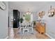 Charming dining area with stylish decor, white chairs, and a round rug for cozy Gathering meals and entertaining at 85 Ann Se Cir, Cartersville, GA 30121