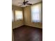 Cozy bedroom featuring hardwood floors and a ceiling fan at 1415 Dodson Sw Dr, Atlanta, GA 30311