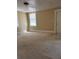 Spacious living room with carpet at 1415 Dodson Sw Dr, Atlanta, GA 30311