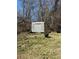 Outdoor metal storage shed sitting on the property's grounds at 1415 Dodson Sw Dr, Atlanta, GA 30311