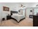 Cozy bedroom with neutral carpet, ceiling fan, and ample natural light at 1484 Ben Park Way, Grayson, GA 30017