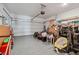 Two-car garage with a gray speckled floor, packed with household goods and boxes at 1484 Ben Park Way, Grayson, GA 30017