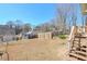 Large backyard with a wooden fence and mature trees providing ample privacy at 160 Vine Nw St, Atlanta, GA 30314