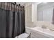 Modern bathroom features a dark shower curtain, vanity, and functional design at 160 Vine Nw St, Atlanta, GA 30314