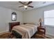 Comfortable bedroom features a ceiling fan, natural light, and neutral decor at 160 Vine Nw St, Atlanta, GA 30314