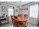 Bright dining area featuring wood floors, natural light, and seating for six at 160 Vine Nw St, Atlanta, GA 30314