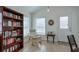 Cozy sitting area with a bookshelf, comfortable chair, and bright windows at 160 Vine Nw St, Atlanta, GA 30314