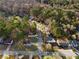 Neighborhood aerial view displaying numerous homes and tree coverage at 2735 Varlet Ct, Snellville, GA 30039