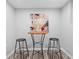 Charming bar area with sleek table and bar stools, perfect for entertaining guests at 2735 Varlet Ct, Snellville, GA 30039