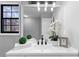 Bright bathroom featuring white vanity, modern fixtures, mirror, and decor at 2735 Varlet Ct, Snellville, GA 30039