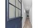 Entryway featuring hardwood flooring, a blue door, and interior views at 2735 Varlet Ct, Snellville, GA 30039