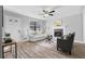 Inviting living room with hardwood floors, fireplace and lots of natural light at 2735 Varlet Ct, Snellville, GA 30039