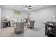 Relax in the comfort of this living room with decorative lamps and soft, neutral colors at 2735 Varlet Ct, Snellville, GA 30039