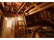 Attic access via ladder with exposed wood framing at 3117 Kings Arms Ne Ct, Atlanta, GA 30345