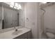 Bathroom with a vanity and mirror, with a bathtub and shower, offering functionality and a clean aesthetic at 3117 Kings Arms Ne Ct, Atlanta, GA 30345