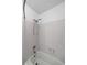 Clean bathroom featuring a white tiled shower and tub at 3117 Kings Arms Ne Ct, Atlanta, GA 30345