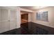 Dining area with black tile floors, white walls, and a view into the basement at 3117 Kings Arms Ne Ct, Atlanta, GA 30345