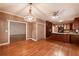 Spacious kitchen with stainless appliances, granite countertops, and hardwood floors at 3117 Kings Arms Ne Ct, Atlanta, GA 30345