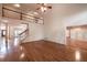Open-concept living room with hardwood floors and large windows at 3117 Kings Arms Ne Ct, Atlanta, GA 30345