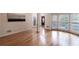 Living Room featuring hardwood floors, large windows, and a decorative column at 3117 Kings Arms Ne Ct, Atlanta, GA 30345