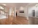 Spacious living room featuring gleaming hardwood floors, neutral walls, and decorative columns at 3117 Kings Arms Ne Ct, Atlanta, GA 30345