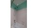 Clean white tiled shower over tub with modern shower head at 3117 Kings Arms Ne Ct, Atlanta, GA 30345