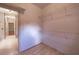 Spacious walk-in closet with wire shelving and light-colored laminate flooring at 3117 Kings Arms Ne Ct, Atlanta, GA 30345