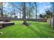 Grassy backyard featuring manicured lawn and mature trees at 1499 May Se Ave, Atlanta, GA 30316