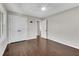 Well-lit bedroom showcases hardwood floors and closet storage at 1499 May Se Ave, Atlanta, GA 30316