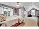 A cozy bedroom with carpet and two separate areas for relaxation at 2138 Jockey Hollow Nw Dr, Kennesaw, GA 30152