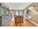Dining room with a rustic wood table and hardwood floors at 2138 Jockey Hollow Nw Dr, Kennesaw, GA 30152